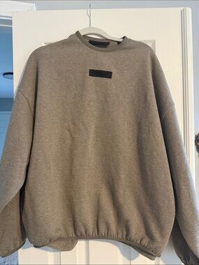 Essentials Gray Crewneck Sweatshirt with Small Black Patch